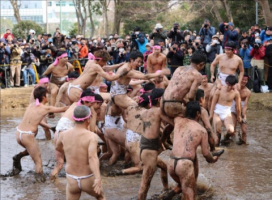 Naked, mud drenched warriors battling it out