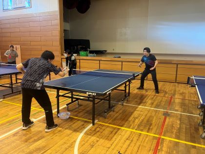 月舘選手と練習をする先生の様子