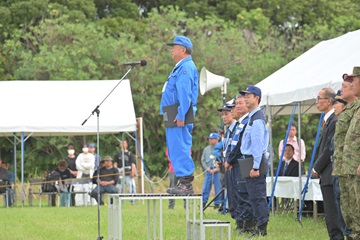 九都県市合同防災訓練であいさつをする三沢副議長
