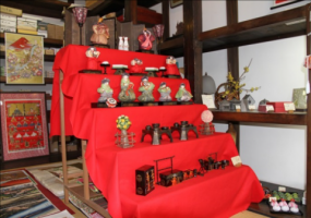 Another view of dolls on display